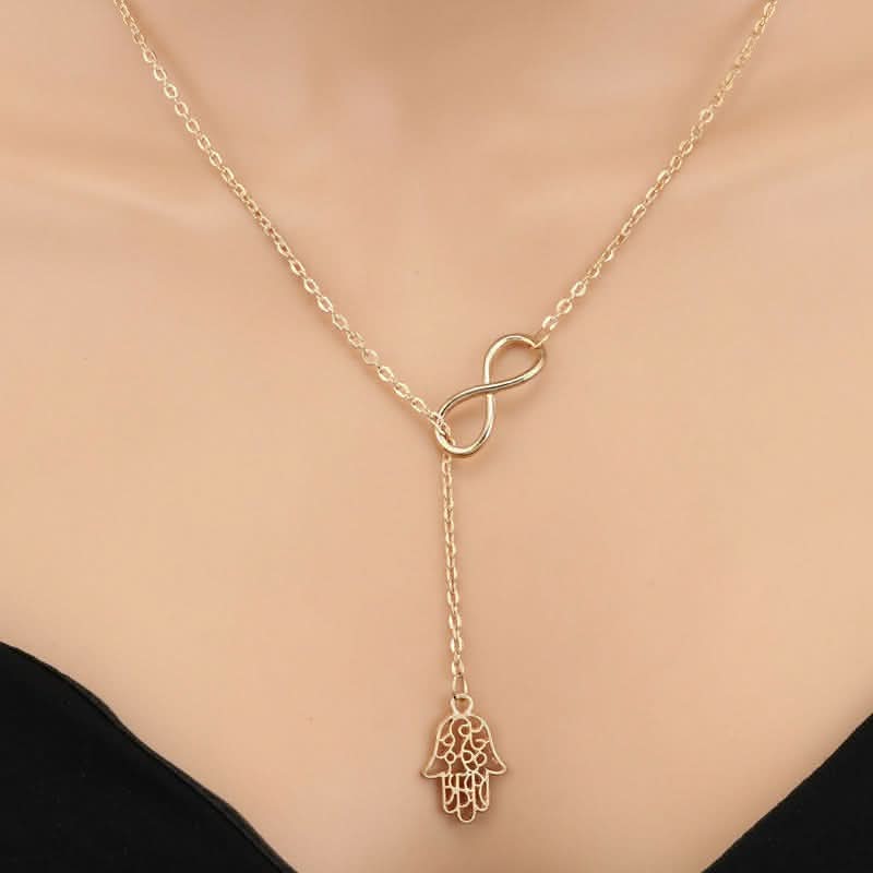Faith & Protection: Infinity Cross & Hamza Gold Necklace Set of 3 - Image 4